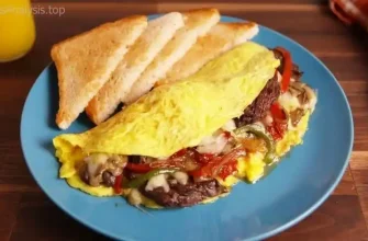 Fold in the sides of the tortilla, then roll it up tightly from the bottom, ensuring the fillings are secure inside. A little trick to avoid spillage is to make sure the tortilla is slightly overstuffed—this helps create a sturdy wrap.